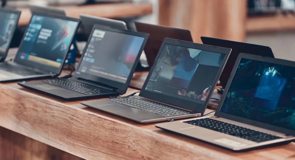 Dell laptop lineup displayed on table showing various models